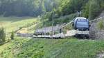 Doppelpendelzug der Montreux–Berner Oberland-Bahn (MOB) mit ABe 4/4 und Be 4/4 km bei 23,3 zwischen La Tine und Montbovon (Quelle Wikipedia, Bild Plutowiki, CC0)