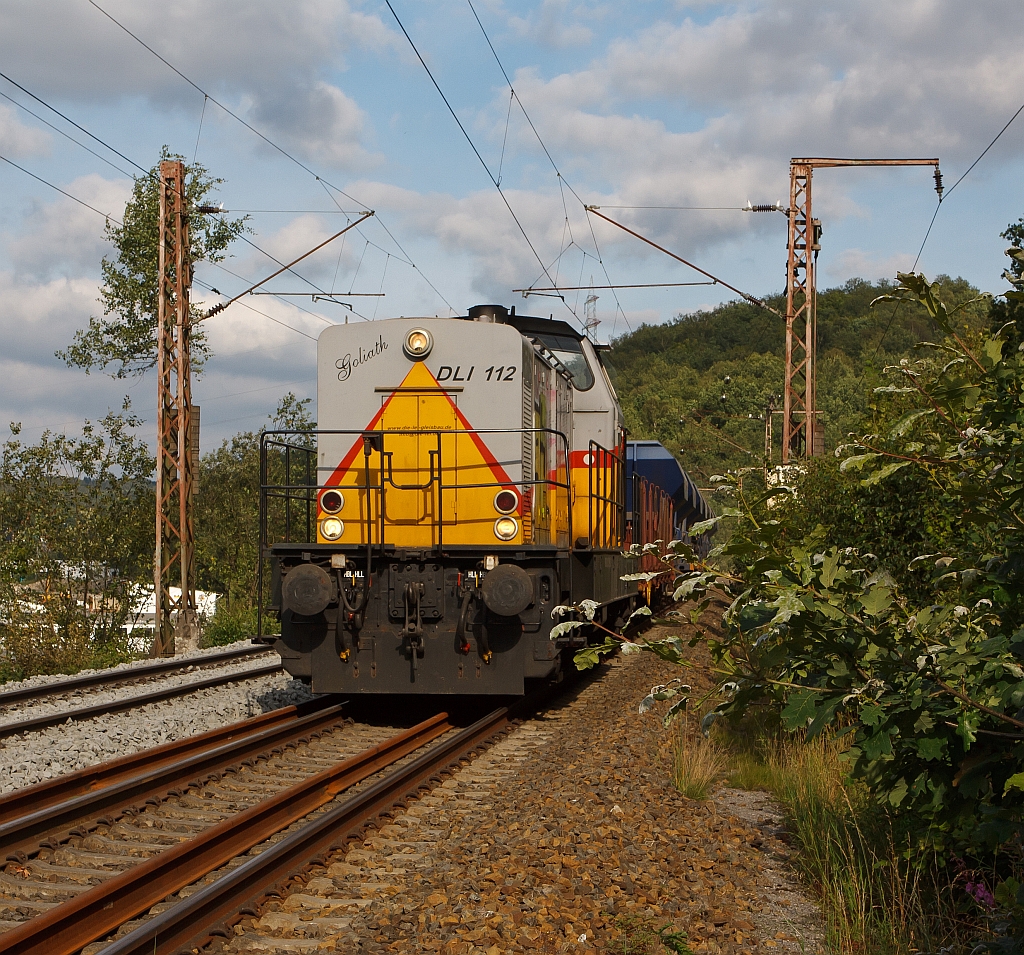 
DLI 112  Goliath  der Die-Lei GmbH (Kassel) mit leerem Sch�ttgutwagenzug f�hrt mit 20 kmh am 29.07.2011 �ber das Baugleis in Wilnsdorf-Anzhausen (an der KBS 445) in Richtung Siegen. Die Lok vom Typ DG 1200 BBM (Bauart B'B'-dh) wurde 1966 von Deutz unter der Fabrik-Nr. 57982 gebaut. Auslieferung an die KFBE K�ln-Frechen-Benzelrather Eisenbahn, K�ln (V 75) ab 1992 HGK (V 37 und 1997 in DH 37).