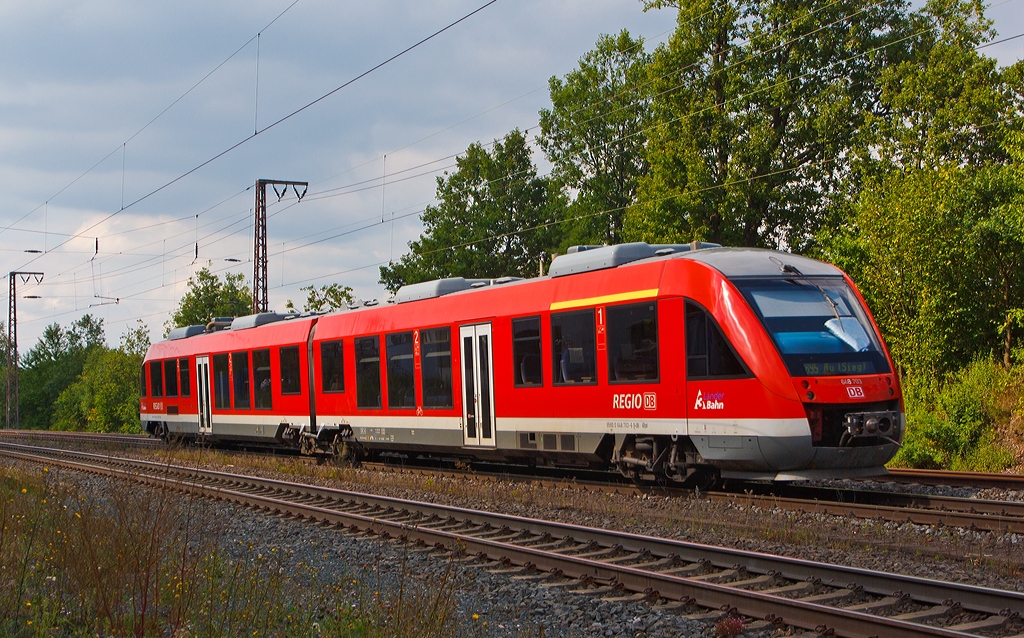Der Alstom Coradia LINT 41 (Dieseltriebwagen) 648 203 / 703 der DreiL�nderBahn als RB 95  Sieg-Dill-Bahn  (Dillenburg-Siegen-Betzdorf/Sieg-Au/Sieg) hat gerade (am 20.08.2013) den Bahnhof Rudersdorf (Kr. Siegen) verlassen und f�hrt nun, auf der KBS 445 (Dillstrecke), in Richtung Siegen weiter.