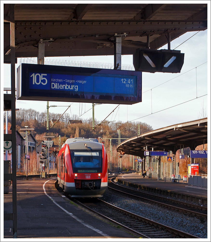 Der Dieseltriebwagen 648 702 / 202 (ein Alstom Coradia LINT 41) der DreiL�nderBahn als RB 95 (Au/Sieg-Siegen-Dillenburg), am 31.12.2013 bei der Einfahrt auf Gleis 105 in den Bahnhof Betzdorf/Sieg.