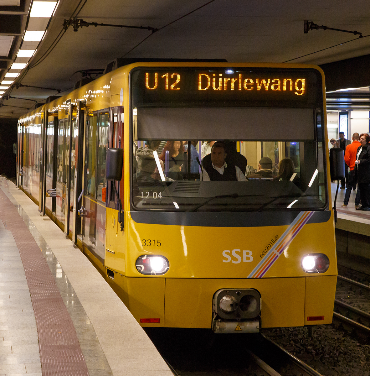 Der SSB 3315/3316 ein Stadtbahn-Doppeltriebwagen vom Typ S-DT 8.10 am 17.06.2016, als Linie U 12 nach D�rrlewang, beim Halt in der Station Hauptbahnhof / Arnulf-Klett-Platz.