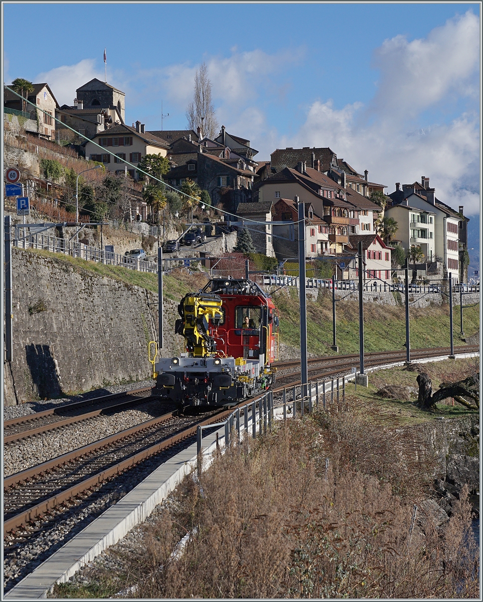 Der Tm 234.422-4  Dart  (Windhoff) ist bei St-Saphorin auf dem Weg in Richtung Lausanne. 

10. Januar 2022