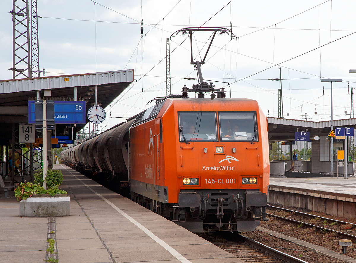
Die 145-CL 001 (91 80 6 145 081-6 D-EKO) der ArcelorMittal Eisenh�ttenstadt Transport GmbH (ex EKO Transportgesellschaft mbH, Eisenh�ttenstadt) f�hrt am 21.05.2016 mit einem Kohlestaubzug (Staubgutwagen der Gattung Uacs) durch den Hauptbahnhof Magdeburg. 

Die TRAXX F140 AC wurde 1999 von ABB Daimler-Benz Transportation GmbH (Adtranz) in Kassel unter der Fabriknummer 33356 f�r die Hannover Leasing GmbH, die der eigenliche Eigent�mer ist, gebaut. Die Lok hat die EBA-Nummer EBA 95T14A 081.