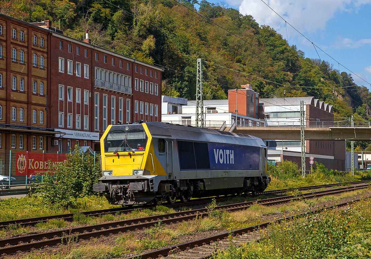Die Lok 3 bzw. 264 003-5 (92 80 1264 003-5 D-STOCK), eine der drei Voith Maxima 40 CC der Stock - Transport - e.K. aus Main f�hrt am 02.09.2020 als Lz bei Koblenz-Oberwerth �ber die Linke Rheinstrecke (KBS 471) in Richtung Mainz. Im Hintergrund die Koblenzer Brauerei (fr�her K�nigsbacher Brauerei).

Die Voith Maxima 40 CC wurde 2008 von Voith in Kiel unter der Fabriknummer L06-40003 gebaut.