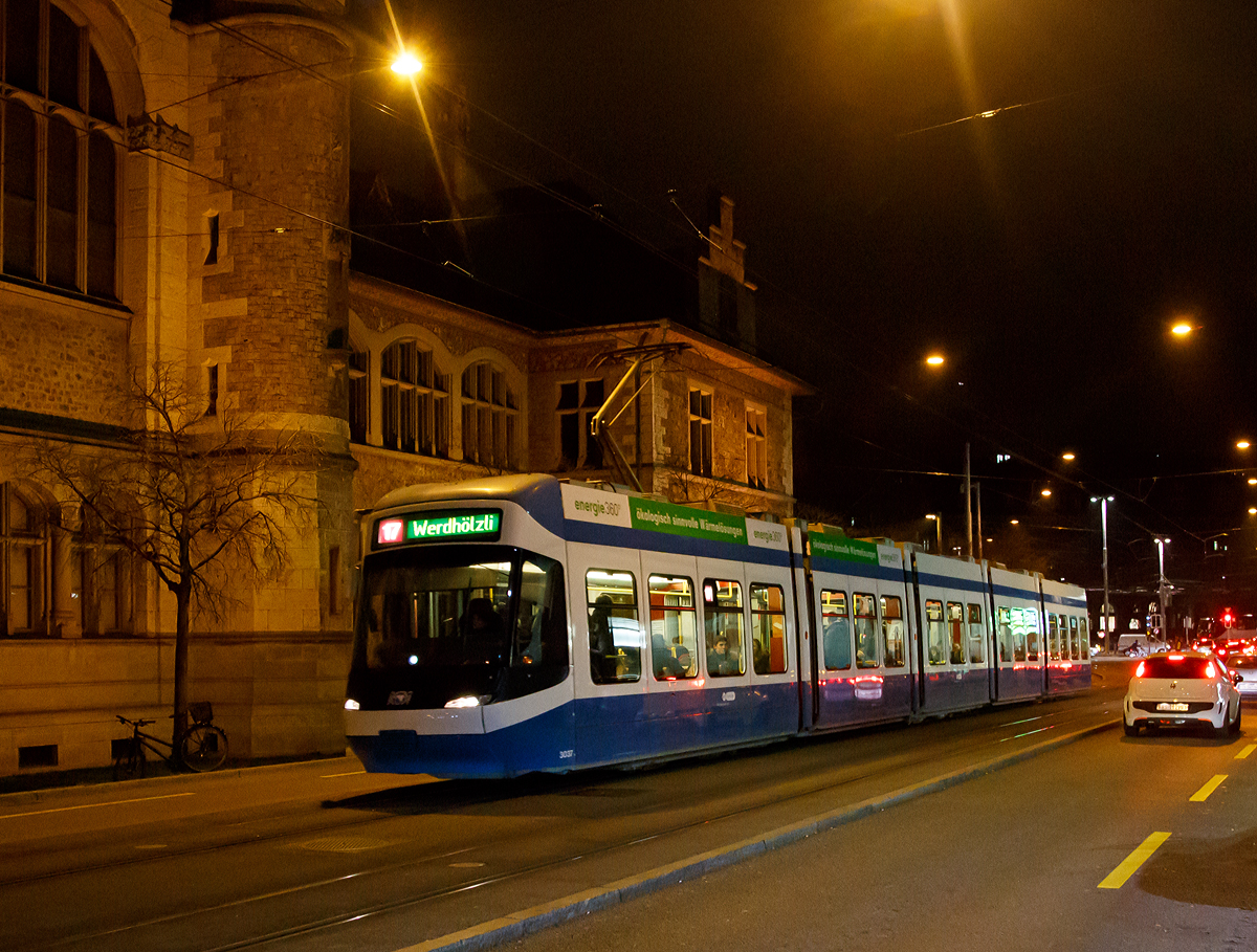 Die VBZ-Tram - Be 5/6 3037, eine   Bombardier Cobra, als Linie 17 nach Werdh�lzli f�hrt am 30.12.2015 am Z�rich HB vorbei.