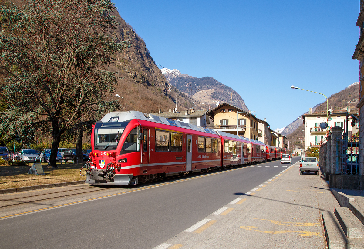 Ein RhB Regional-Zug erreicht am 19.02.2017 Tirano, der Zug besteht aus dem 3-teiligen ALLEGRA-Zweispannungstriebzug (RhB ABe 8/12) 3515  Alois Carigiet  mit 5 angehangenen Personenwagen.

Auf der Berninabahn sind die Triebzüge das Haupttraktionsmittel und ziehen Regionalzüge, den Bernina-Express sowie Güterzüge.  

Dieser Zweispannungstriebzug ist nicht nur hochmodern, sondern verbirgt in seinem Innern wesentliche Innovationen und viel Power. Die mehrsystemfähige Antriebsausrüstung bringt eine Leistung von 2,6 MW, zudem haben die Triebzüge eine hohe Anfahrzugkraft von 260 kN. Hier auf der Berninabahn (St. Moritz–Tirano) mit einer Maximalsteigung 70 ‰ wird mit 1.000 V Gleichstrom gefahren, auf der Arosabahn und der Bahnstrecke Landquart–Davos Platz im 11 kV 16.7 Hz Wechselstrombetrieb.

TECHNISCHE DATEN der RhB ABe 8/12: 
Nummerierung:  3501–3515
Anzahl:  15
Hersteller:  Stadler Rail
Baujahre:  2009–2010
Achsformel:  Bo’Bo’+2’2’+Bo’Bo’
Spurweite:  1.000 mm (Meterspur)
Länge über Puffer:  49.500 mm
Höhe:  3.800 mm
Breite:  2.650 mm
Leergewicht:  106 t
Höchstgeschwindigkeit:  100 km/h
Max. Leistung (am Rad):  2.600 kW bei AC / 2.400 kW bei DC
Anfahrzugkraft:  260 kN
Treibraddurchmesser:  810 mm (neu) / 740 mm (abgenutzt)
Laufraddurchmesser:  685 mm  (neu) / 635 mm (abgenutzt)
Achsabstand im Motordrehgestell: 2.000 mm
Achsabstand im Laufdrehgestell: 1.800 mm
Stromsystem:  11 kV 16.7 Hz AC und 1 kV DC
Anzahl der Fahrmotoren:  8
Sitzplätze:  1. Klasse: 24 / 2. Klasse: 76 + 14 Klappsitze
Fußbodenhöhe:  480 mm Niederflur / 1.050 mm Hochflur
Niederfluranteil:  22 % 
Anhängelast auf 70‰: 140 t
Anhängelast auf 35‰: 245 t
