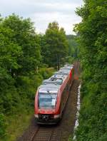   In der grünen Hölle vom Rothaargebirge....Die zwei gekoppelten Alstom Coradia LINT 27 Dieseltriebwagen 640 028 und 640 016 der DreiLänderBahn (DB Regio NRW) fahren am 03.06.2014 vom