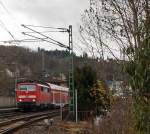111 077-4 mit RE 9 (Rhein-Sieg-Express) Aachen - K�ln - Siegen, hat hier am 10.12.2011 den Bahnhof Betzdorf/Sieg verlassen und f�hrt weiter in Richtung Siegen.