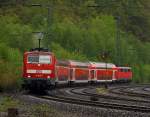 Der RE 9 (Rhein-sieg-Express) Aachen-K�ln-Siegen im Sandwich, gezogen von 111 015-4 und geschoben von 111 077-4, hier am 06.05.2012 kurz vor der Einfahrt in den Bahnhof Batzdorf/Sieg.