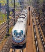 Die Selbe Aufnahme wie bei BB, jedoch habe ich hier noch etwas an den Reglern der Lichtern gespielt:     Ein ICE 3M (BR 406) rauscht am 05.05.2013 durch den ICE-Bahnhof Limburg S�d.