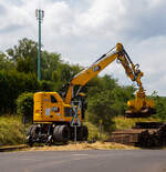 Bei dem Rangierbahnhof der KSW (Kreisbahn Siegen-Wittgenstein) in Herdorf der Betriebsstätte FGE -Freien Grunder Eisenbahn (KSW NE447 / DB-Nr.