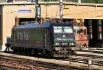 . Aus dem Archiv - Am 06.08.2007 stand die RTS 185 569-1 vor dem BLS D�pot in Brig und dahinter versteckt sich noch eine BLS Ae 8/8. Das Bild wurde vom Bahnsteig aus gemacht. (Hans)