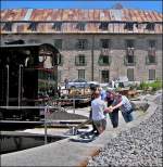 - 2007 in Gletsch - In Anlehnung an das Bild von Hans-Gerd Seeliger, habe ich mein Bild der damaligen Szene an der Drehscheibe noch mal bearbeitet: Die Fahrg�ste (u.a.