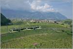 Der TPC ASD ABe 4/8 471 ist in den Rebbergen oberhalb von Aigle auf der Fahrt in Richtung Les Diablerets und zeigt sich bei dieser Bildvariante mit recht viel Landschaft.