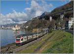 Der SBB CFF RABe 511 021 ist als RE 18425 von Annemasse nach St-Maurice beim Château de Chillon unterwegs.
