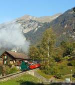 Ein Ausblick am 01.10.2011 morgens aus dem Hotelfenster, die Heiz�l befeuerte Lok 15 der BRB f�hrt von Brienz zum Rothorn (2244 m �.
